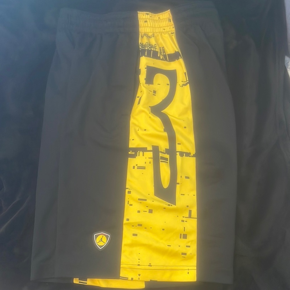 COPY - Black and yellow Sri fit Jordan brand shorts.